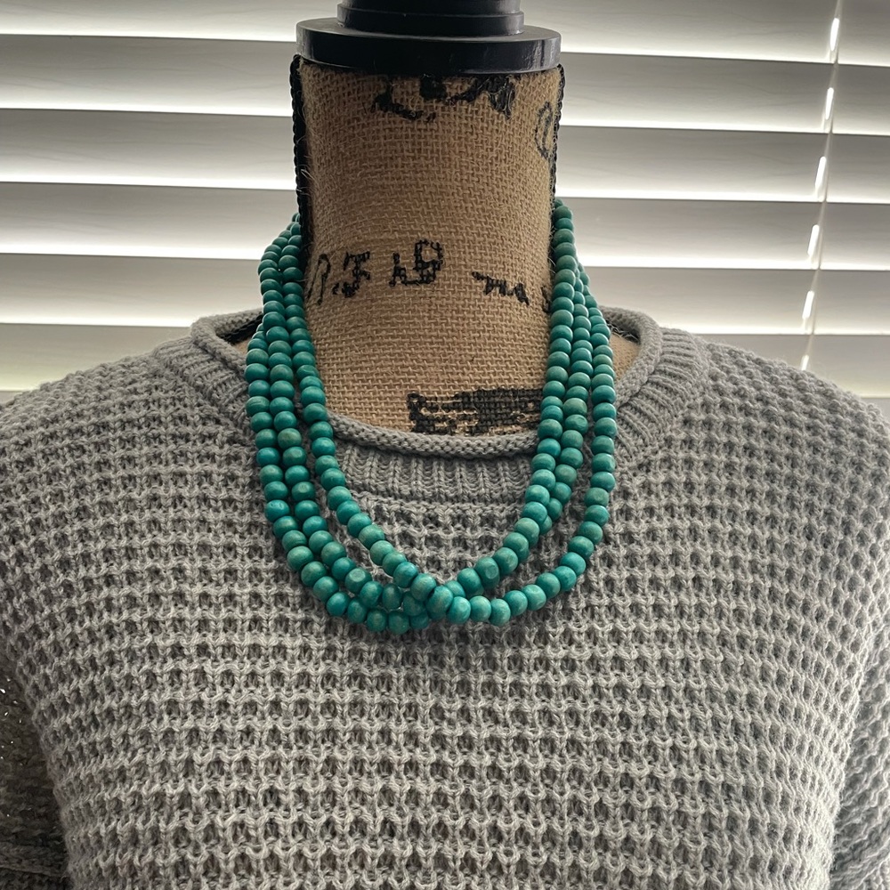 Wooden turquoise color multi strand necklace